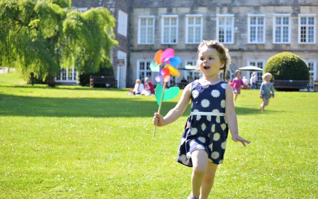 Girl running at Cockington