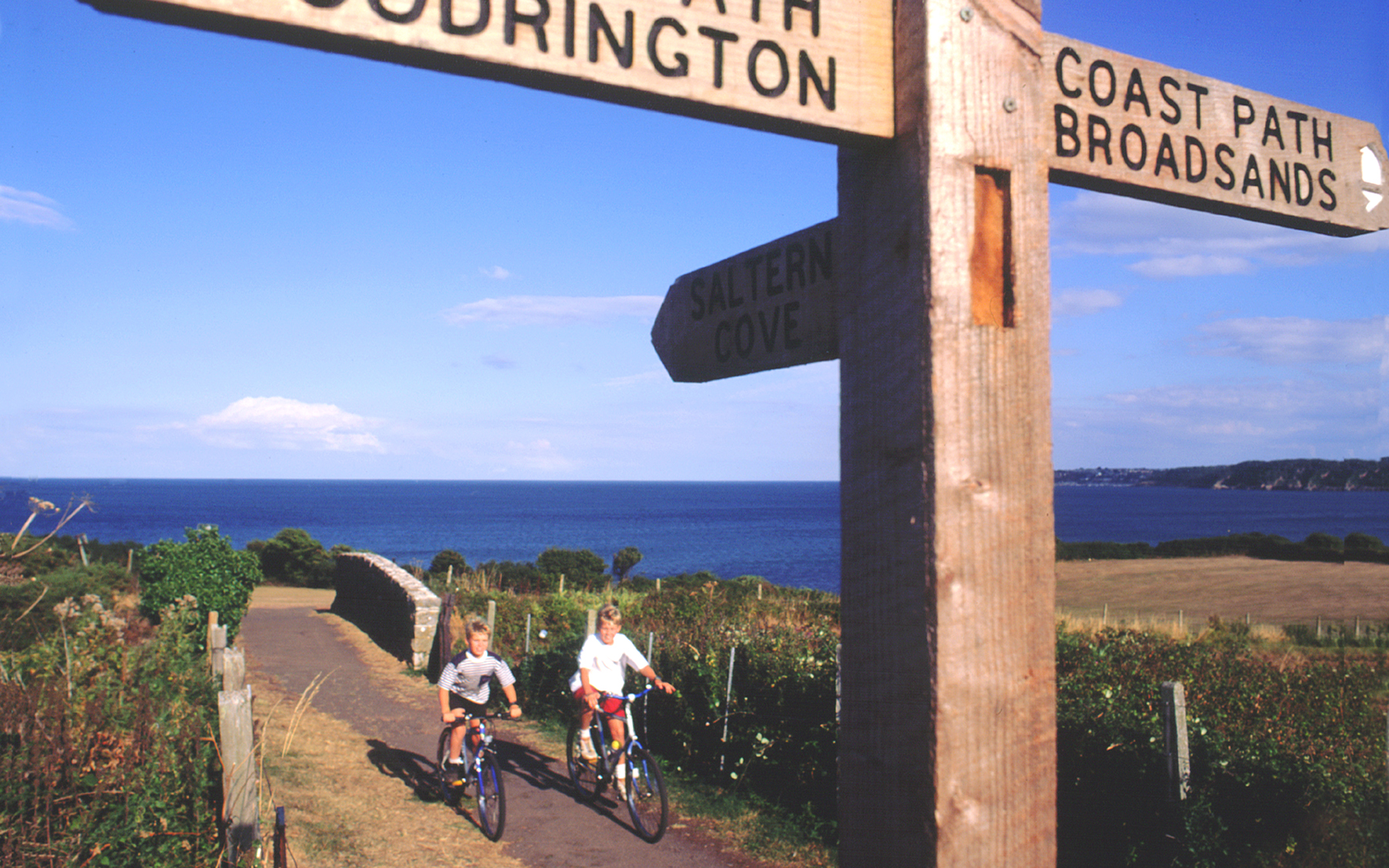 Boys cycling near Goodrington